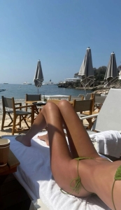 Beachside Bliss: A Model Girl Embraces the Sea