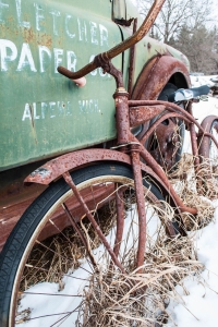 Echoes of the Past: A Vintage Bicycle and Truck in Winter Landscape