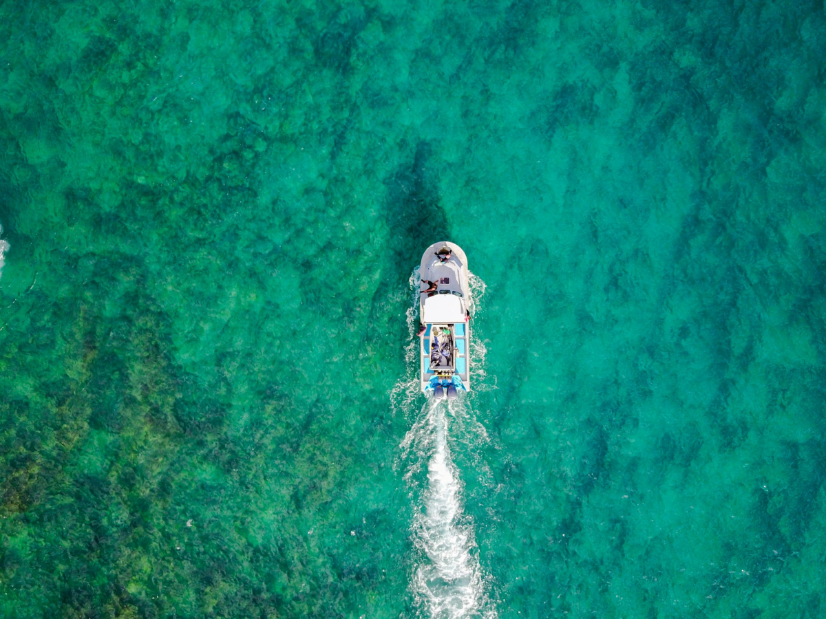 Exploring the Unknown: Journey Through Turquoise Waters Over Hidden Coral Reefs