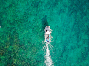 Exploring the Unknown: Journey Through Turquoise Waters Over Hidden Coral Reefs
