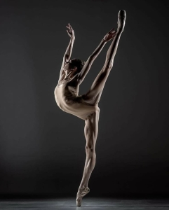Graceful Ballet Dancer: A Study of Strength and Flexibility
