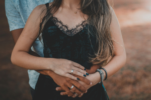 Intertwined Hands in Embrace: The Symbol of Intimacy