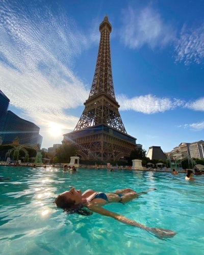 Relaxing by the Fontainebleau Las Vegas Pool with a View of the Eiffel Tower