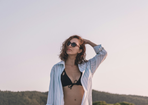 Summer Sunset Serenity: A Red-Haired Girl's Journey in Vourvourou, Greece