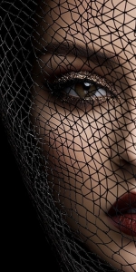 The Veiled Gaze: A Study in Dramatic Contrast