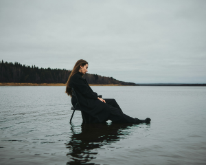Tranquil Beauty: A Model's Moment in Shallow Waters
