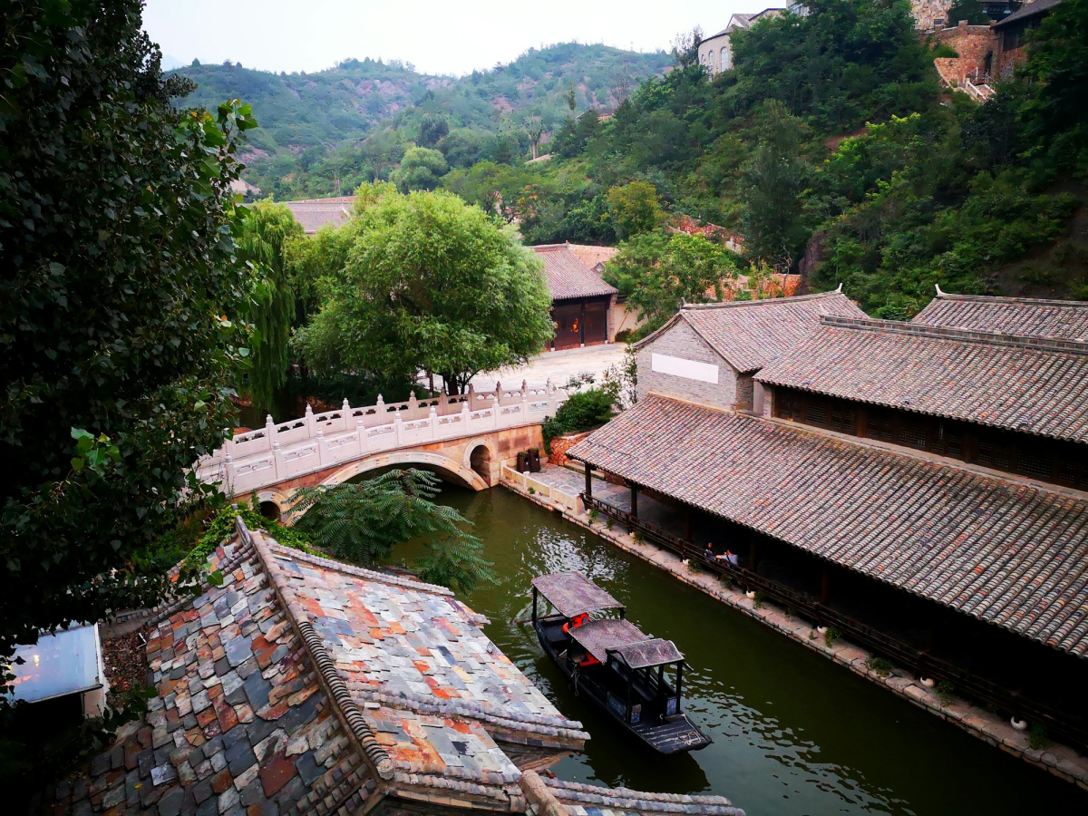 Tranquil Riverside Captured with HUAWEI P20: A Journey Through History