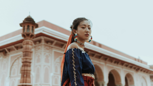 Unveiling Stories through Traditional Attire and Heritage Architecture
