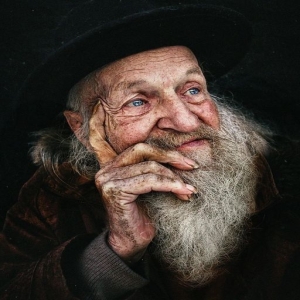 Wisdom in Silence: Reflective Portrait of an Elderly Man